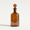 Glass Decorative Bottle with Stopper in Amber